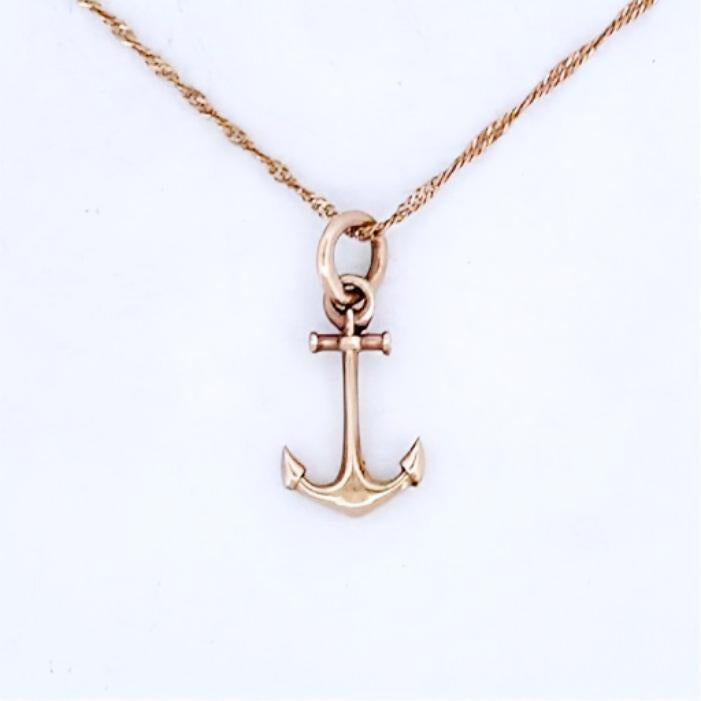 9ct yellow gold anchor charm on fine chain. Nautical theme.