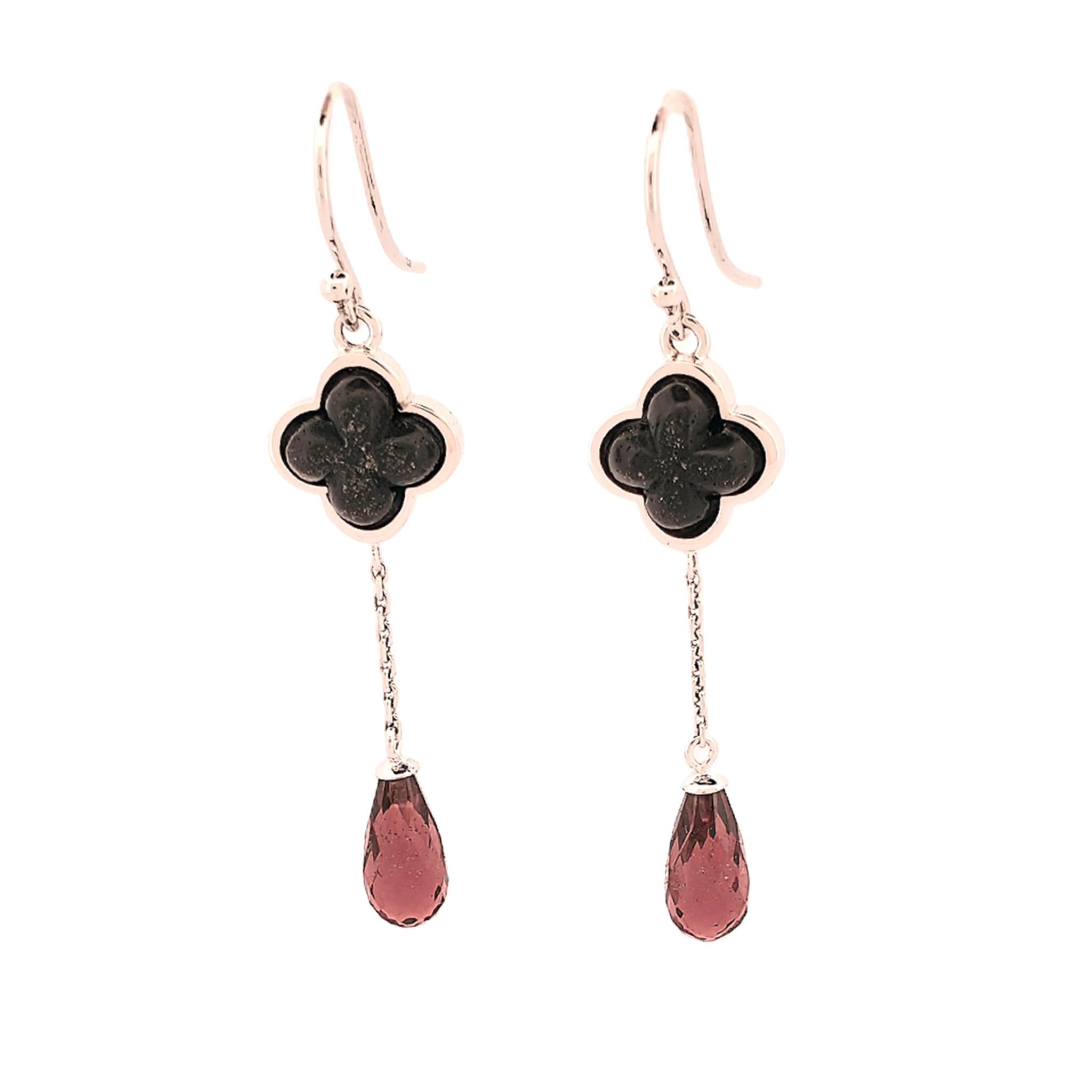 Pair of 9ct white gold drop earrings with ebony clover-shaped tops and garnet teardrop-shaped bottoms
