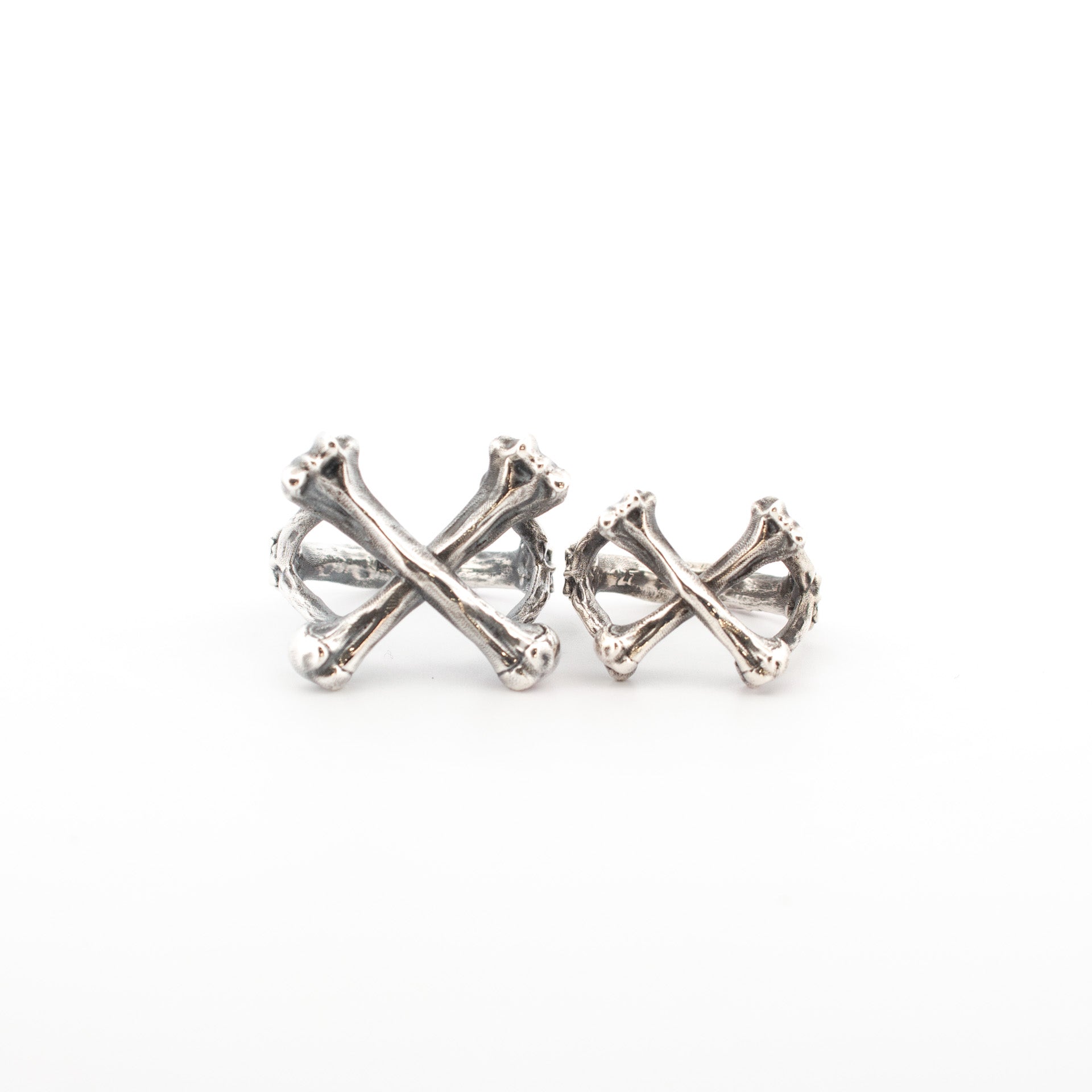 Sterling Silver Crossbones Rings in 15mm and 20mm sizes, handmade skull-and-crossbones style silver jewellery.