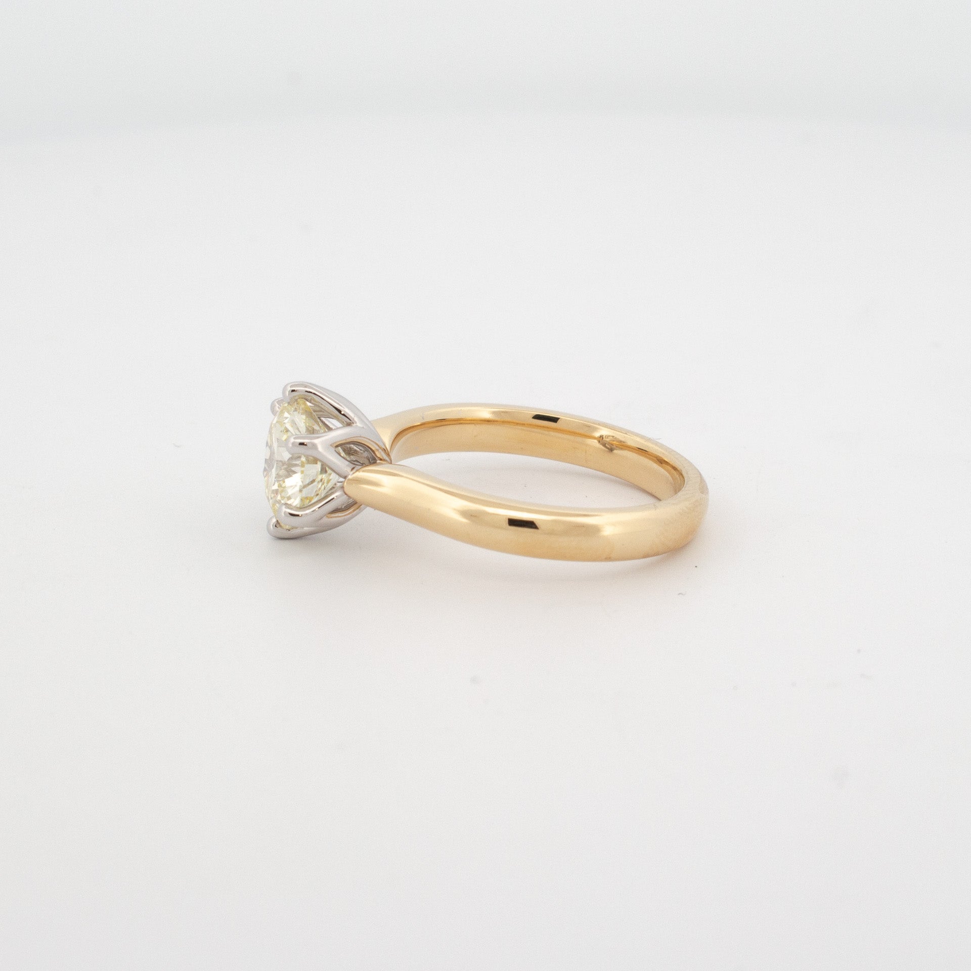 2ct brilliant cut diamond ring with six claw setting, 18ct yellow and white gold band, remodelled using recycled gold