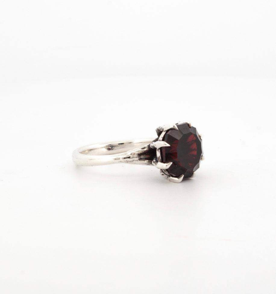 Sterling silver ring with custom cut deep red garnet, claw setting with sculpted talon prongs, gothic handmade design