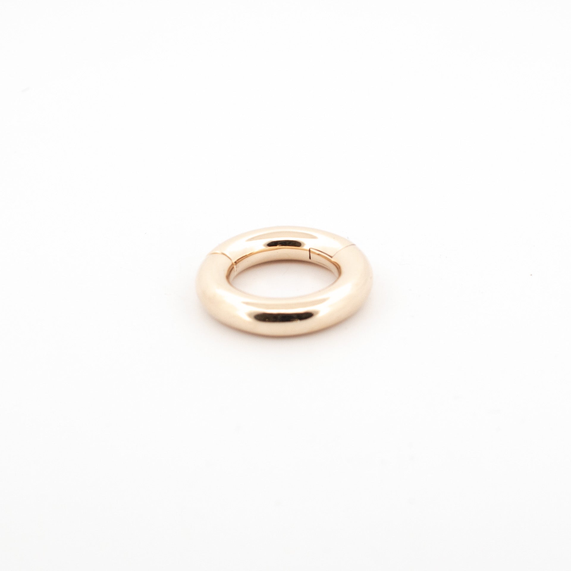 custom made 9ct gold earrings and a septum ring, with a golden finish and rare earth magnets.