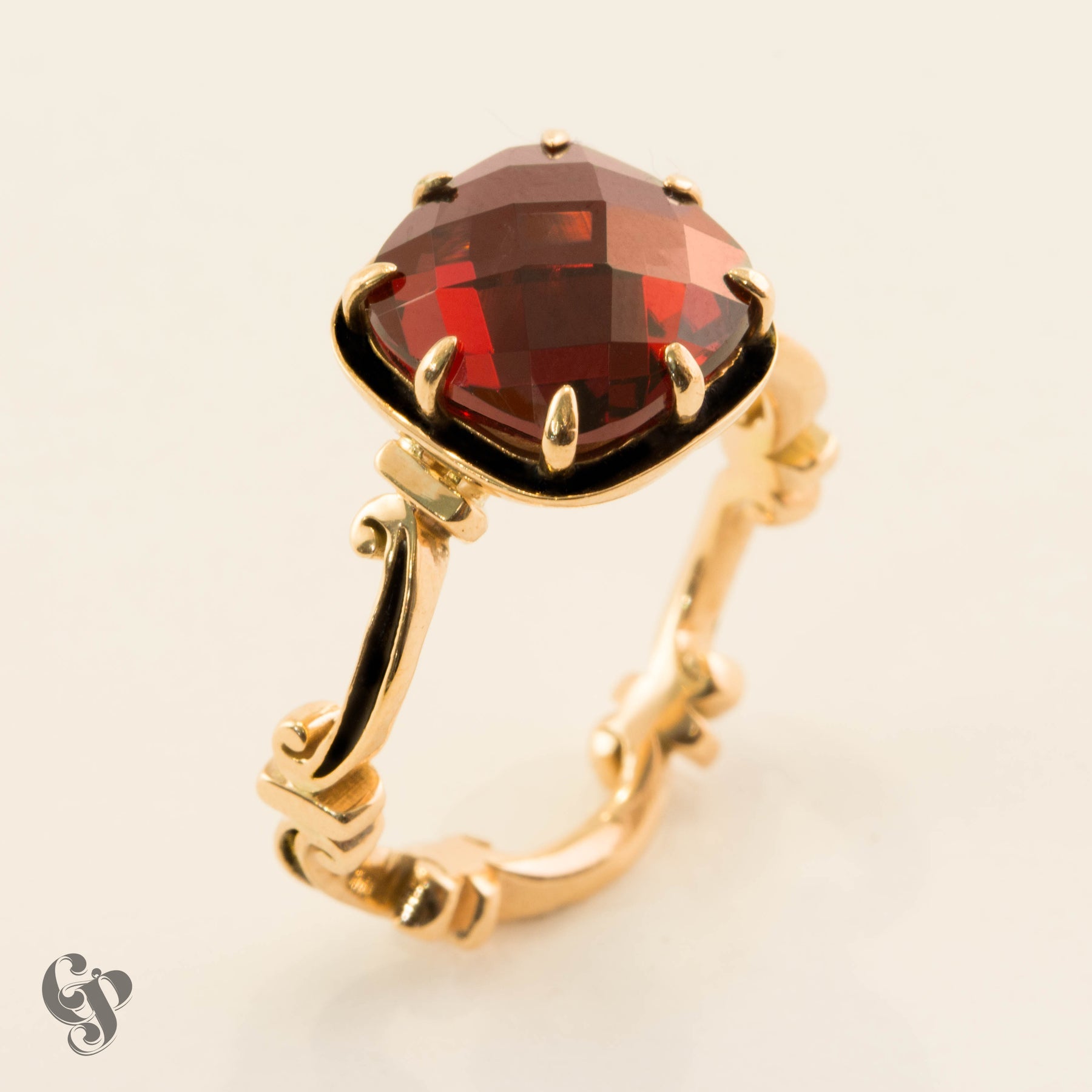 Medieval Scroll Garnet Ring with Black Enamel Detail