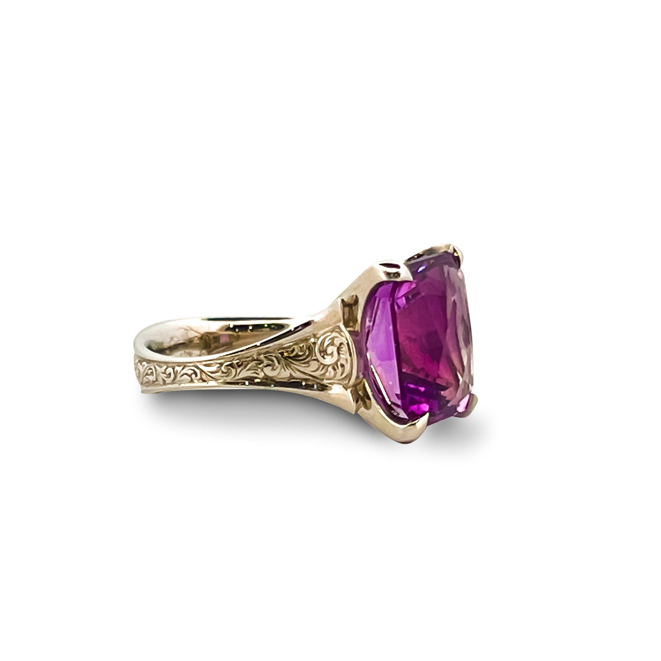 Custom cut rectangular amethyst ring in 9ct white gold with hand engraved scroll detail, claw set statement gemstone
