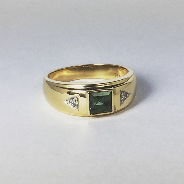 18ct yellow gold ring with square-cut green sapphire and triangular diamond accents, handmade jewellery Newtown.