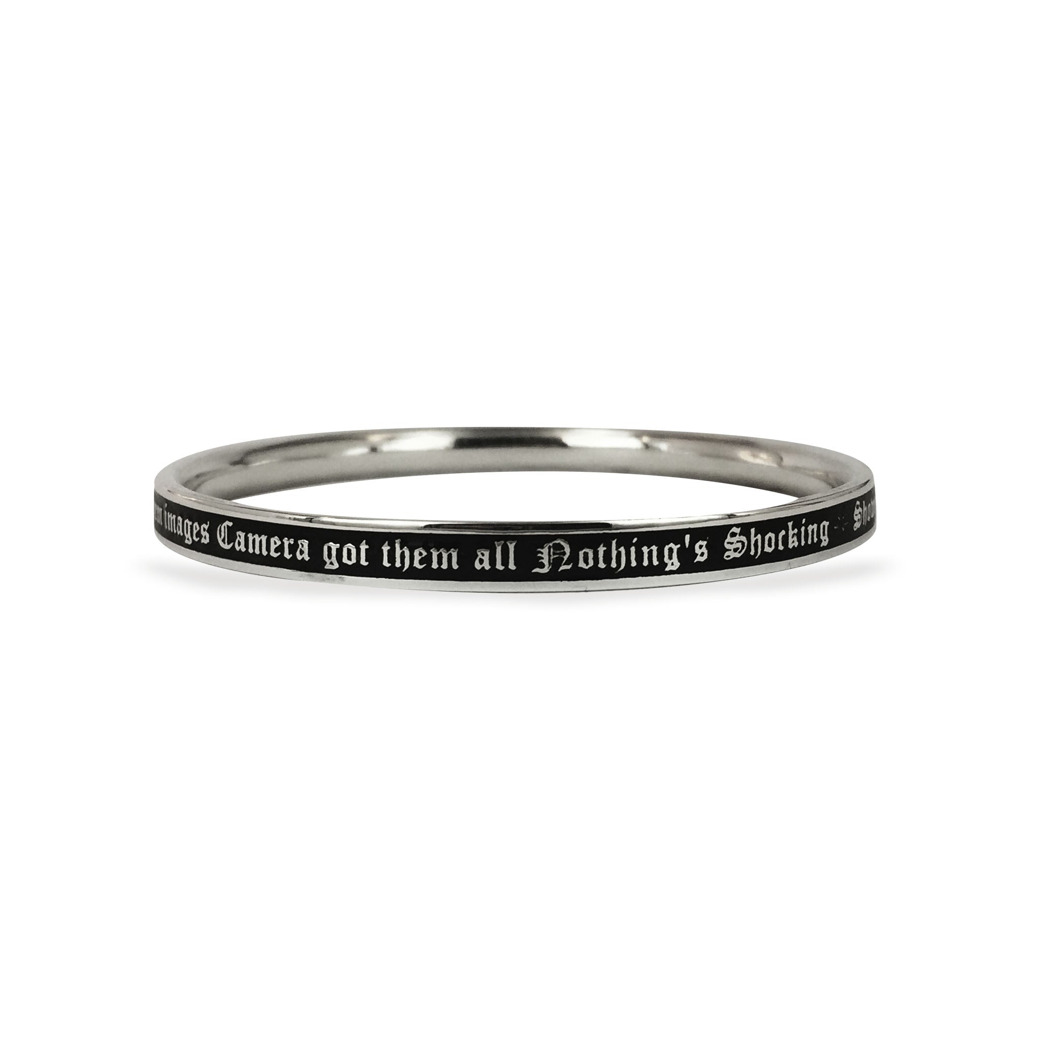 Sterling silver bangle with black enamel engraved gothic script text, polished finish, slim circular band design.