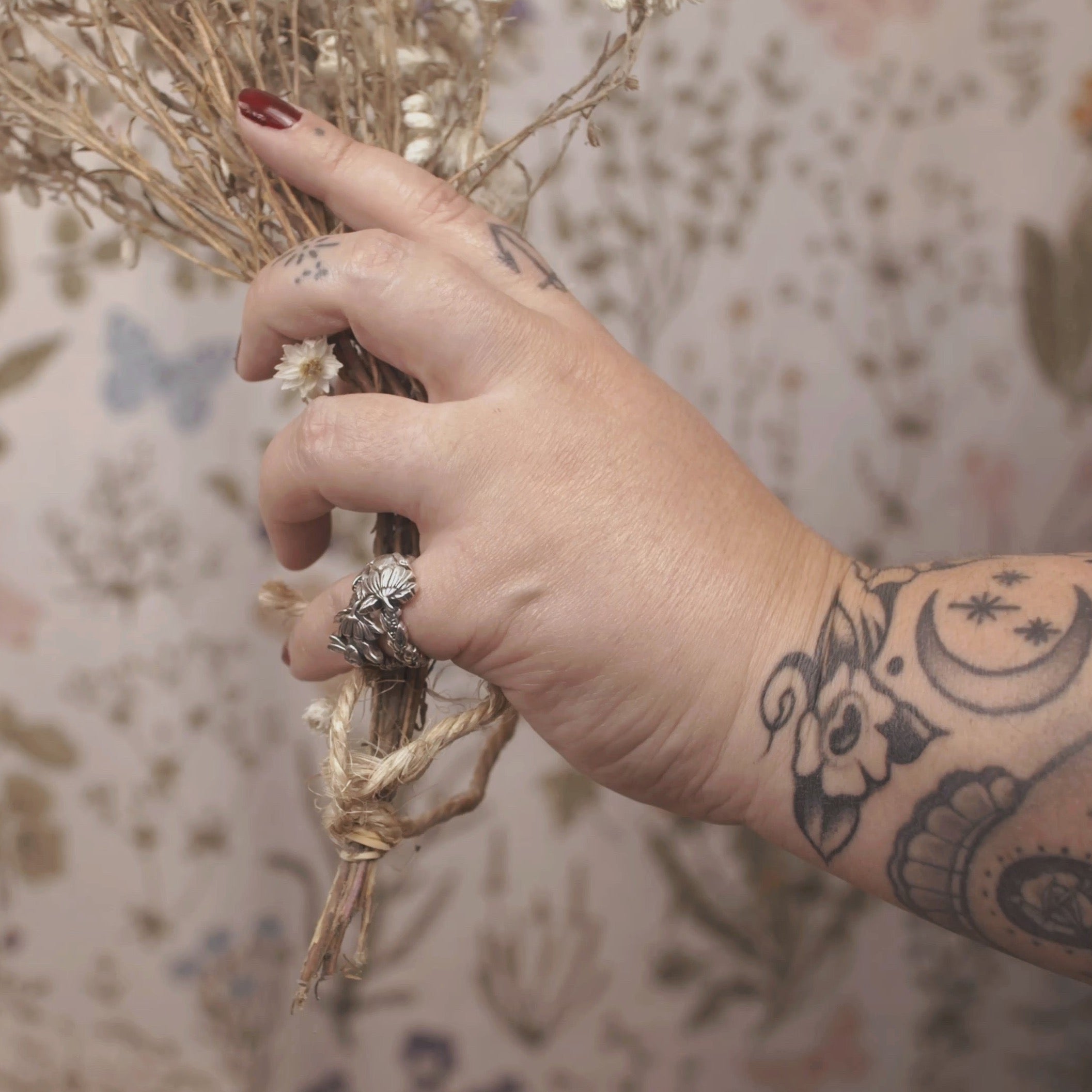 Sterling silver rings with sculpted bunny, owl and floral motifs, detailed woodland design with braided band texture