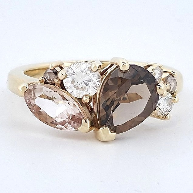 Yellow gold whiskey quartz and morganite ring with champagne and white diamond accents, shown from the front.
