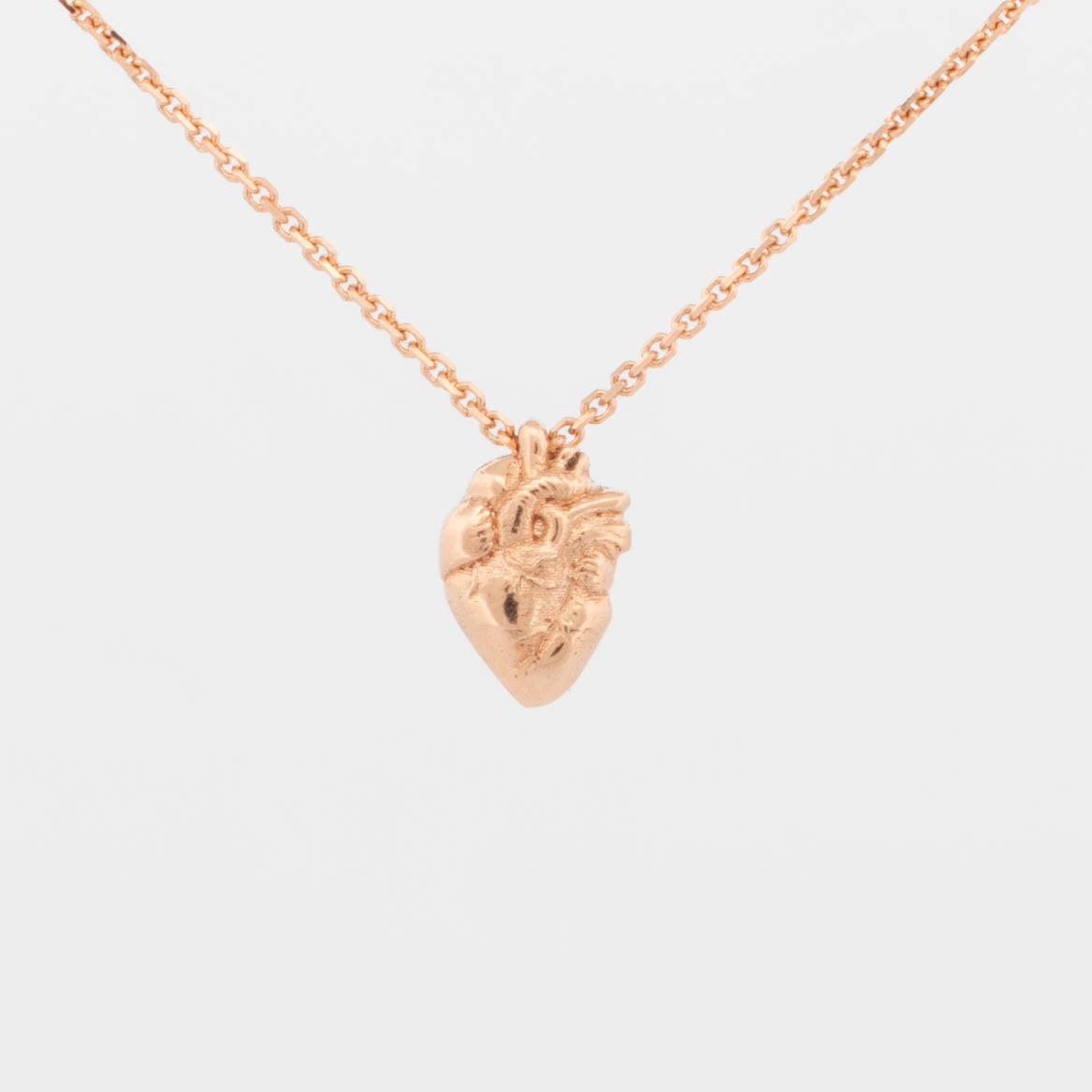 Tiny Rose Gold Anatomical Heart Necklace