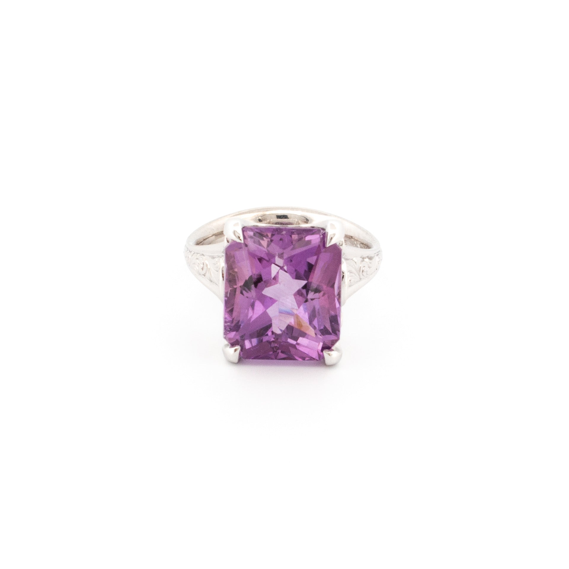 Custom cut rectangular amethyst ring in 9ct white gold with hand engraved scroll detail, claw set statement gemstone