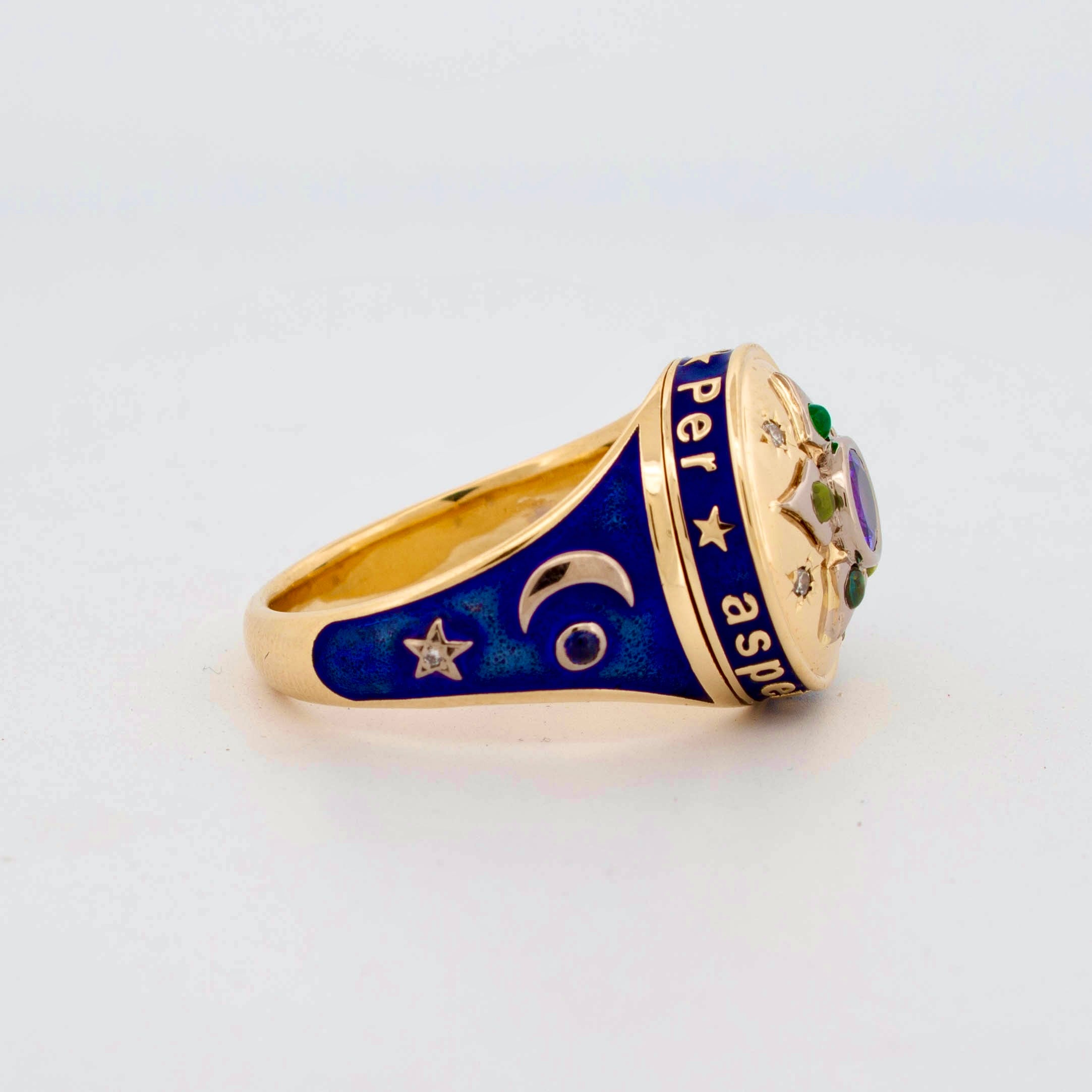 18ct yellow gold mourning-style ring inspired by Victorian jewellery, featuring a central deep blue enamel disc surrounded by family birthstones and star-set diamonds in a radial motif, with navy enamelled shoulders and the engraved motto 'Per Aspera Ad Astra'