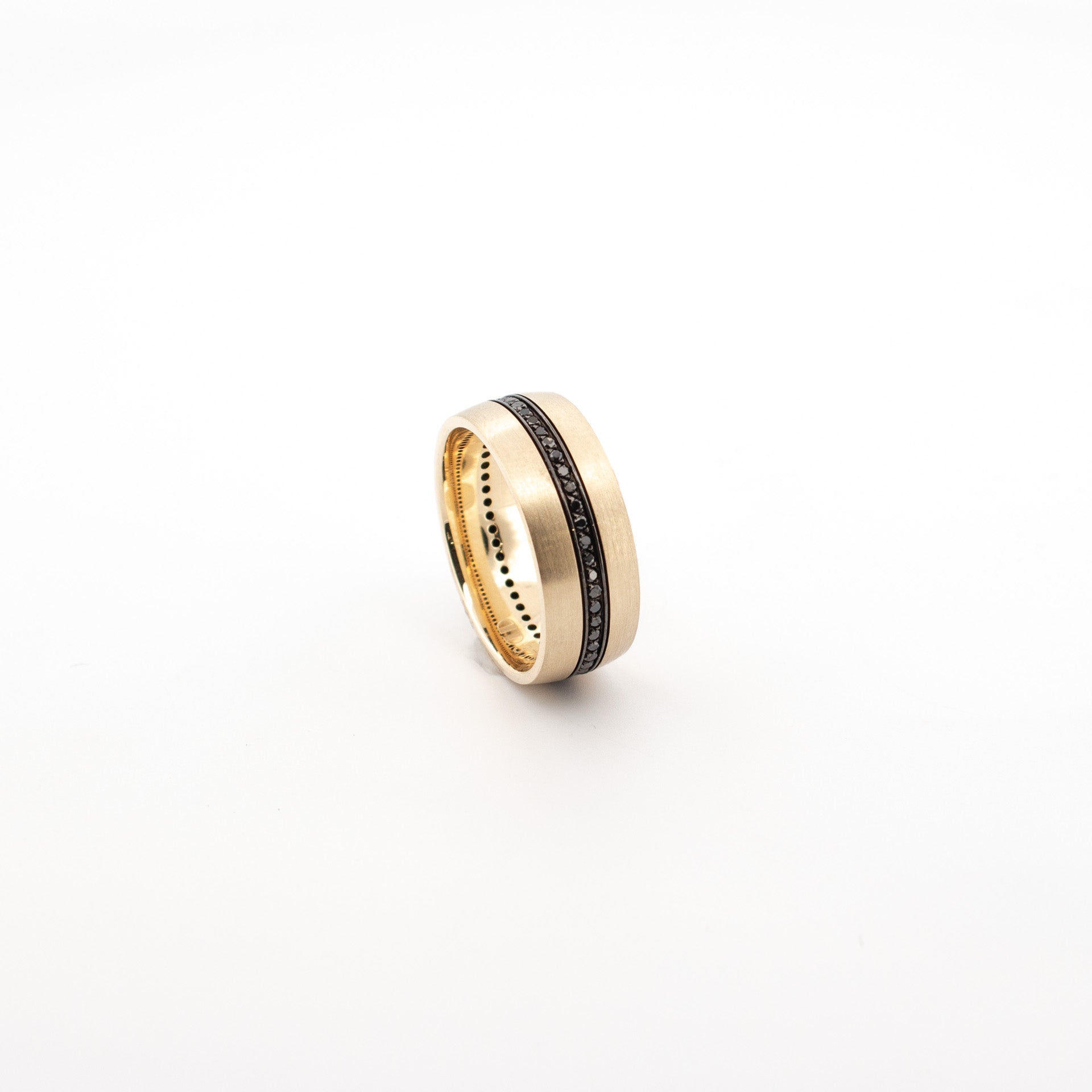 9ct yellow gold ring with central black diamond channel, black rhodium detailing and brushed finish, modern men's wedding band