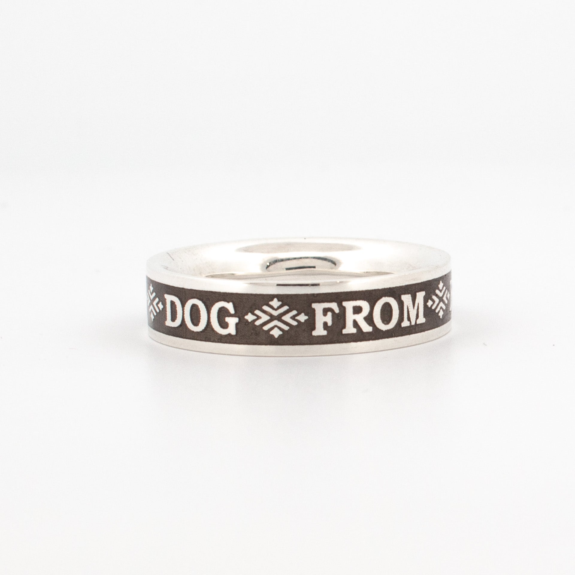 Sterling silver ring with black enamel inlay engraved with "DOG FROM" and symbolic accents, part of Bukowski quote “Love is a Dog from Hell”.
