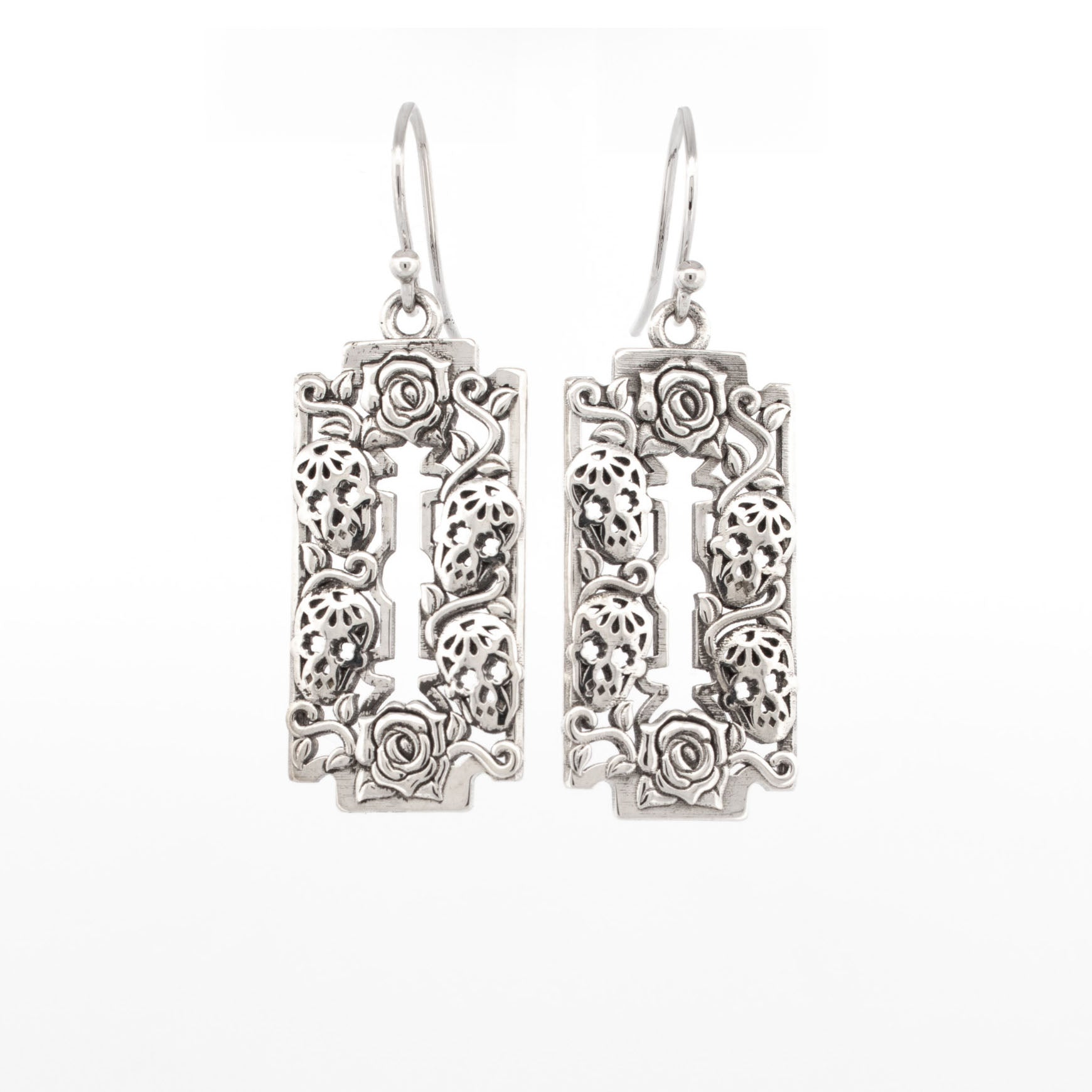 Sterling silver razor blade earrings with floral and skull detailing in gothic relief design.
