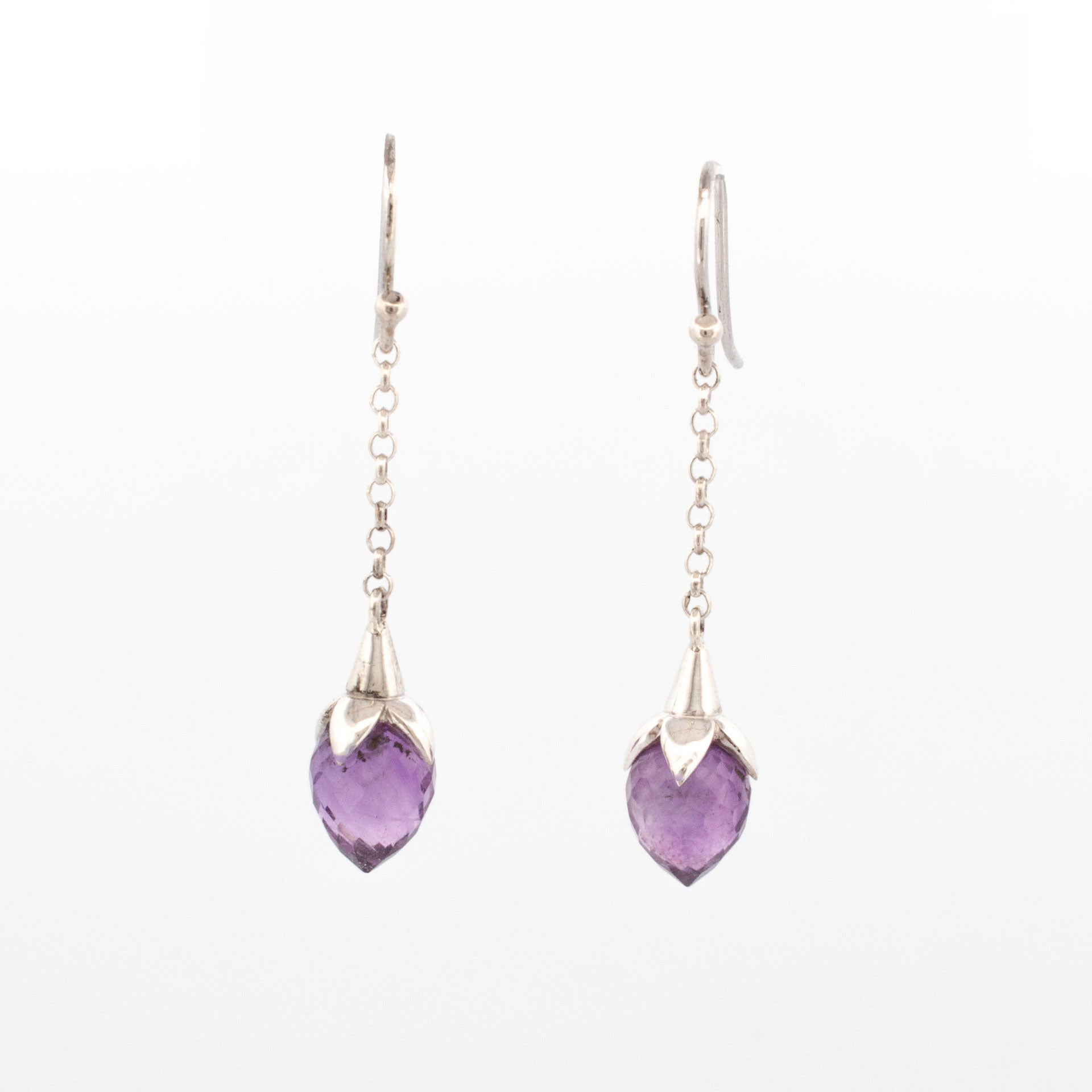 Sterling silver drop earrings with briolette-cut amethyst pods suspended from fine chain links and hook fittings.