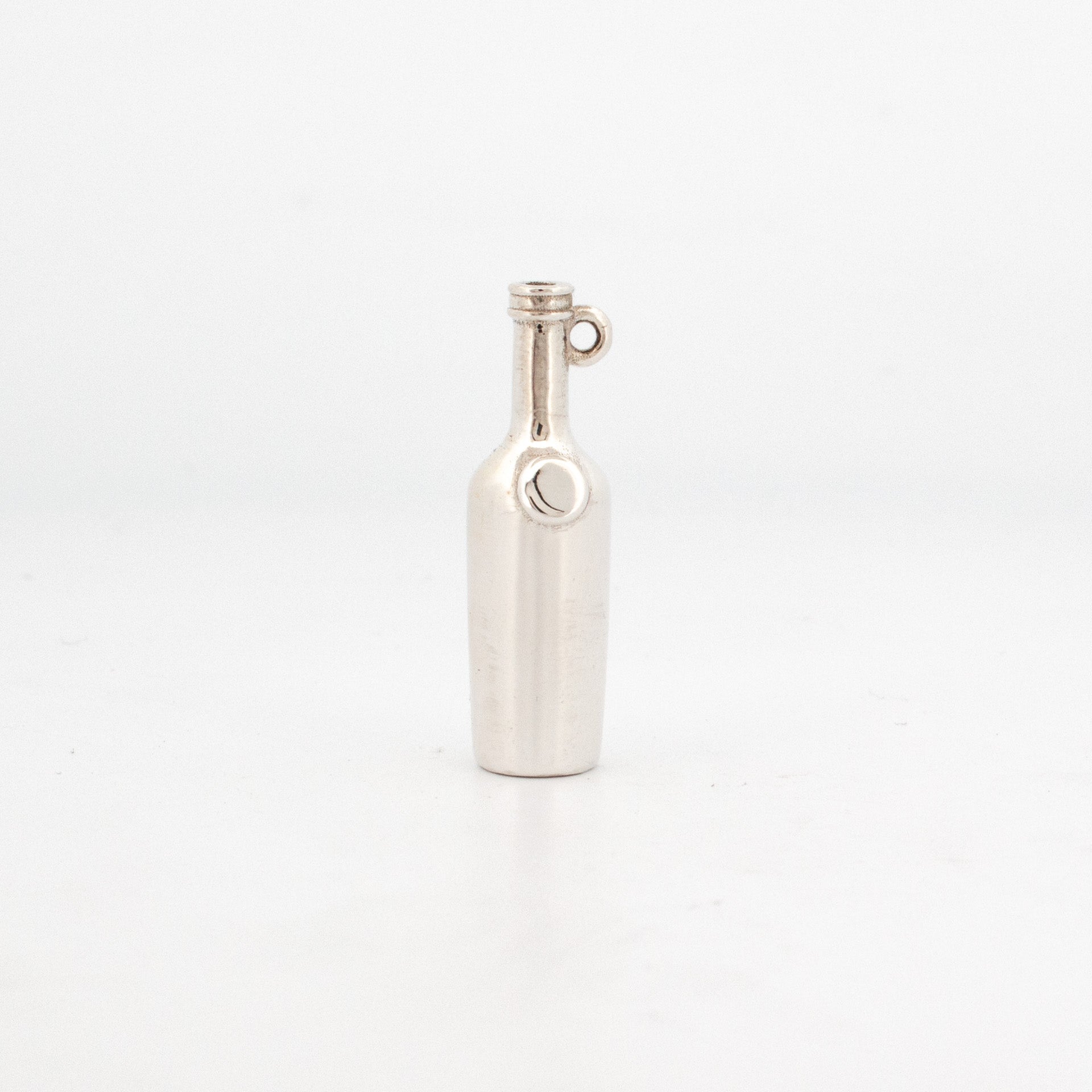 Sterling silver wine bottle charm with side loop, 20mm tall polished miniature bottle pendant.