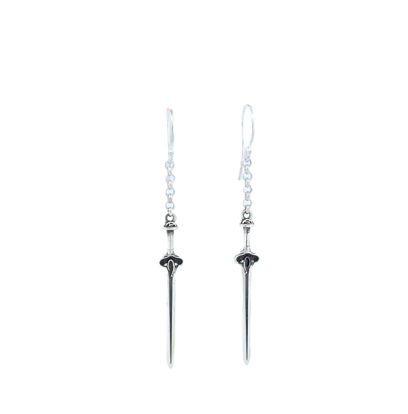Inspired by medieval weaponry and antique talismans, pair of handcrafted sterling silver swords suspended beneath sterling silver chain and hooks