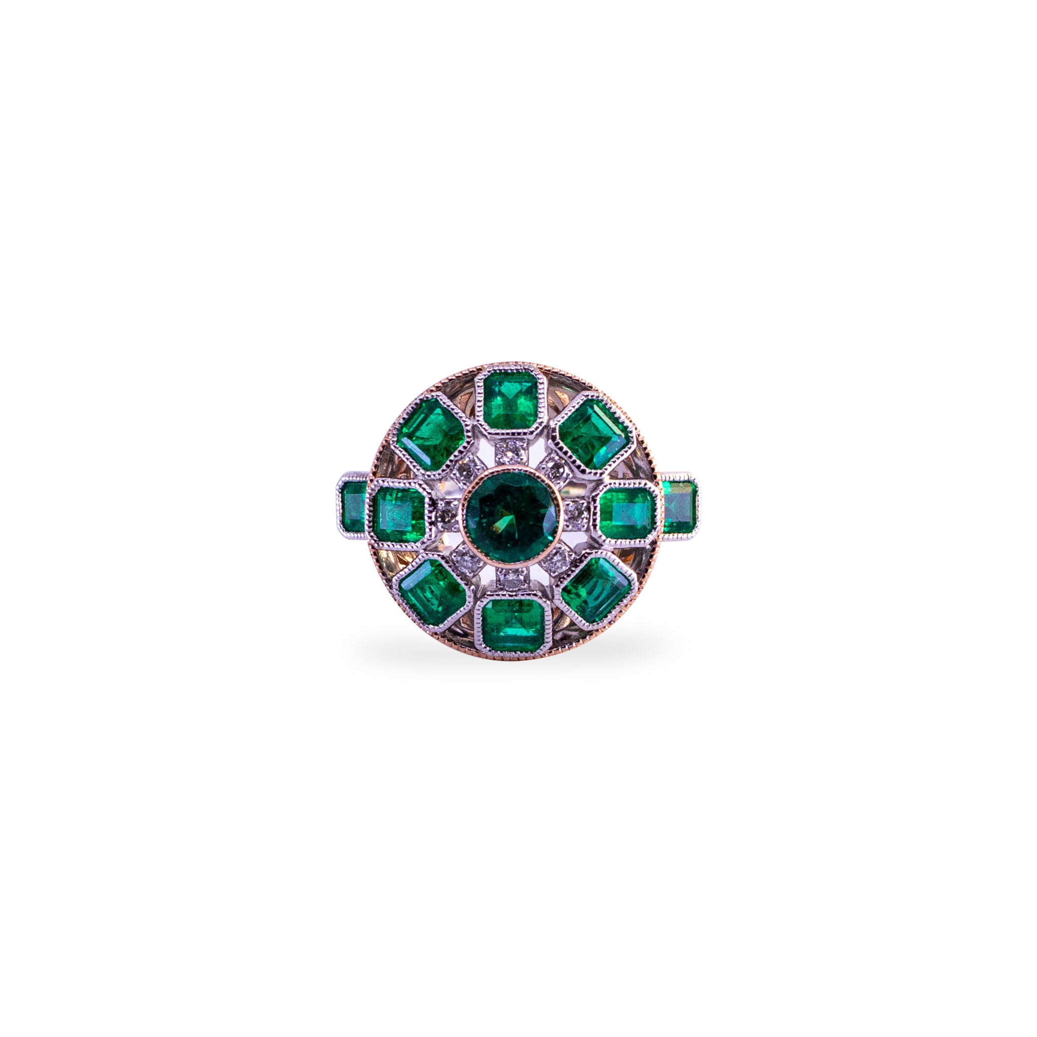 Custom 18ct rose and white gold Art Deco ring featuring central round emerald and halo of square-cut Colombian emeralds with round diamond accents and detailed geometric setting.