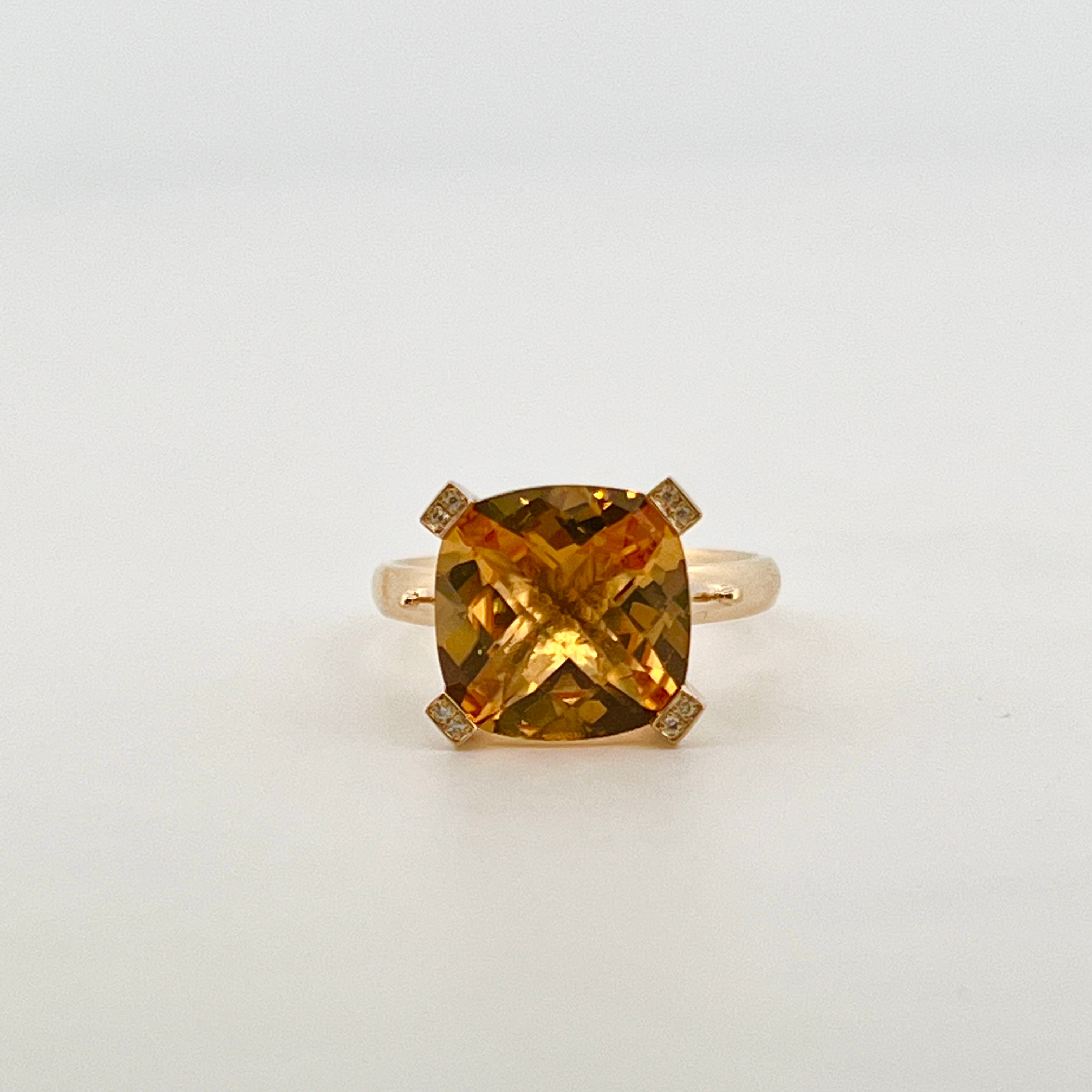 9ct yellow gold ring with 10mm cushion-cut checkerboard citrine and diamond-set claw tips.