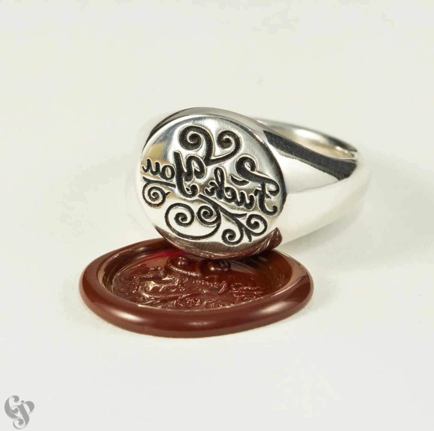 Sterling silver wax seal signet ring engraved with “Fuck You”.