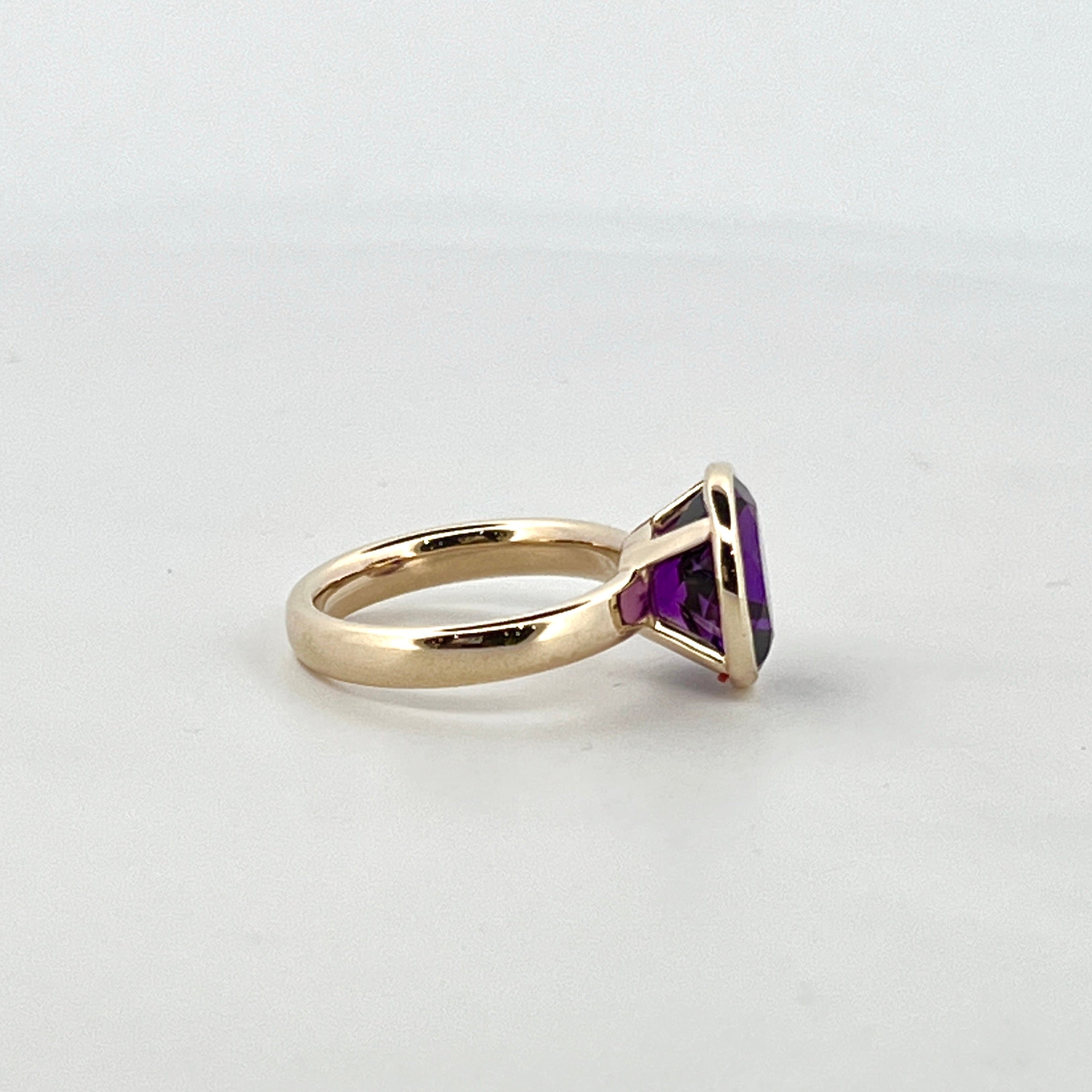 9ct yellow gold ring with 12mm round custom-cut amethyst in bezel setting, handmade jewellery Newtown.
