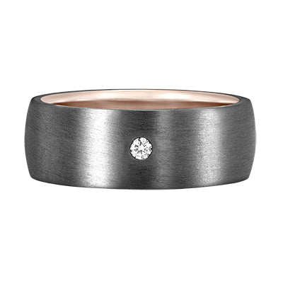 Tantalum ring with matte finish, rose gold polished inner sleeve and gypsy set round diamond, modern two-tone men’s wedding band